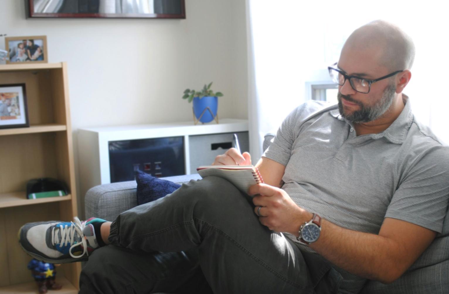 Marketing professionals analyzing campaign data and performance metrics on multiple computer screens